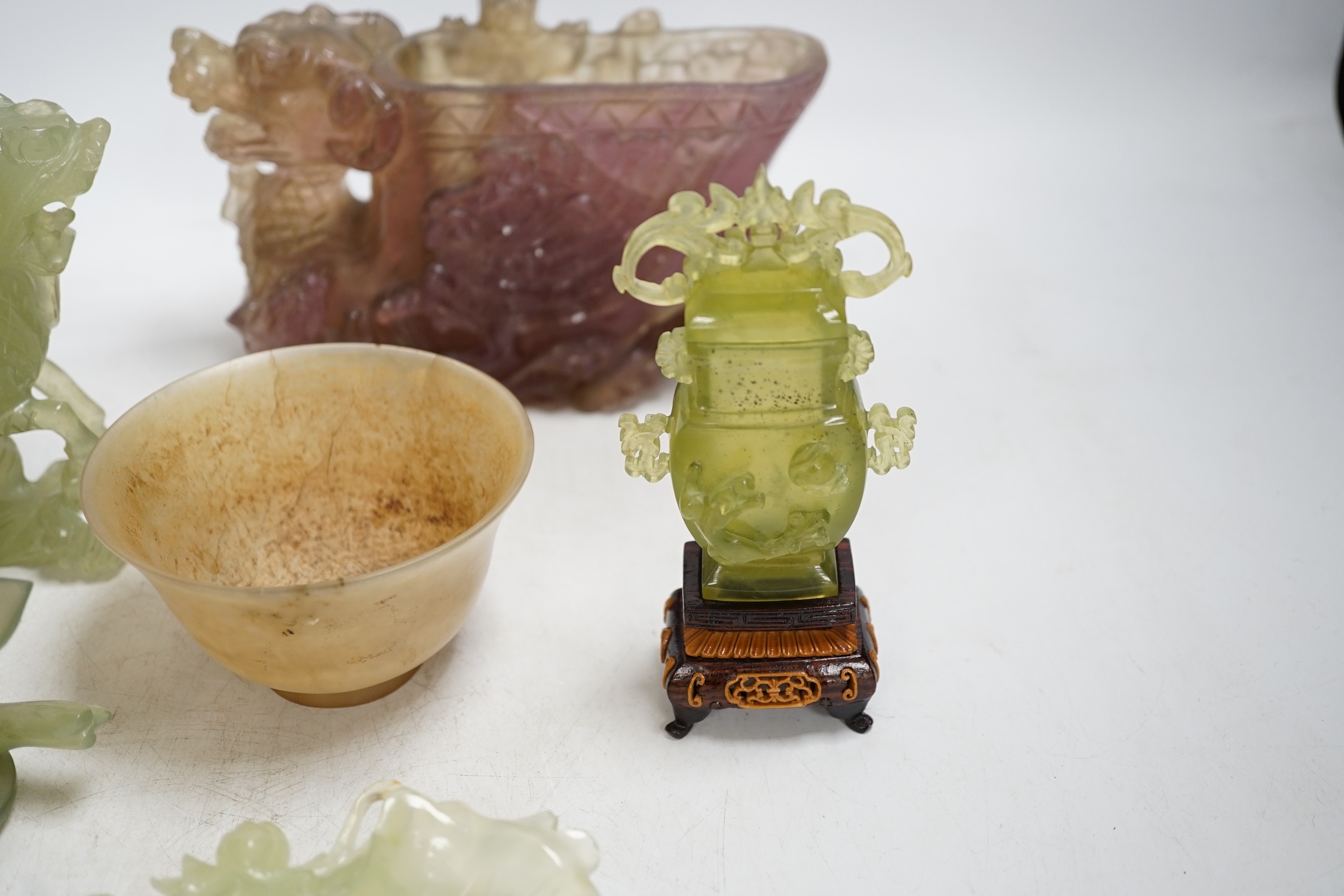 A group of seven Chinese hardstone carvings and vessels, tallest 12cm. Condition - poor to fair